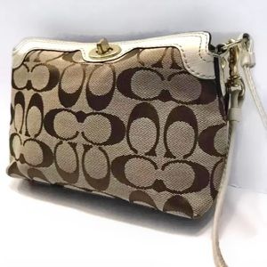 Coach Signature Turnlock Wristlet in beige and off white